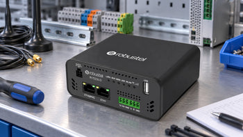 Robustel R1520LG beside antenna leads, hand tools and DIN-rail equipment.